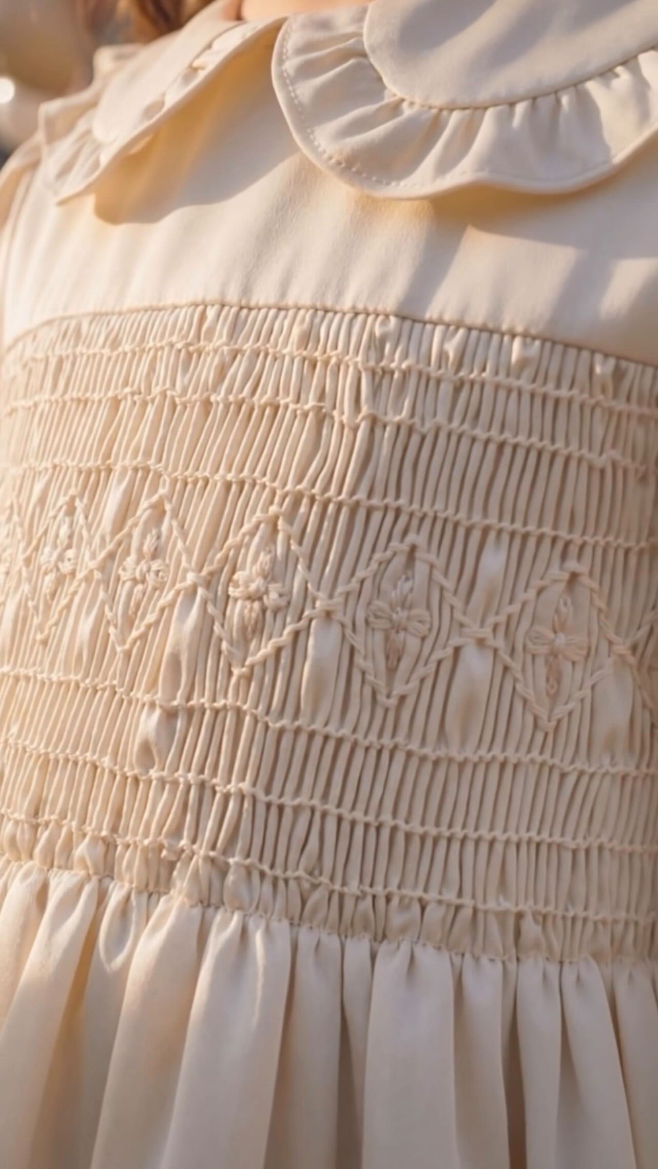 Handsmocking is one of the most intricate traditions in European children’s clothing.

It cannot be rushed. It cannot be automated.

Each panel begins as fabric carefully pleated by hand.
Each stitch sewn individually by skilled artisans.
Thread pulled through in quiet repetition.

It is slow work.
Intentional work.
Work you feel in the final garment.

We preserve it not for nostalgia but because it still matters.